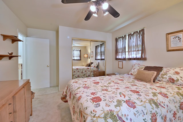 8532 N Olcott Ave, Niles, IL 60714 - bedroom featuring light carpet, a closet, and ceiling fan