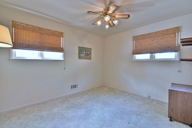 8532 N Olcott Ave, Niles, IL 60714 - carpeted empty room featuring ceiling fan and baseboards