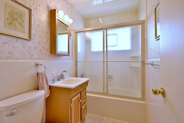 8532 N Olcott Ave, Niles, IL 60714 - bathroom featuring wallpapered walls, vanity, enclosed tub / shower combo, a wainscoted wall, and tile patterned flooring
