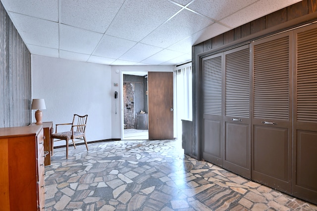 8532 N Olcott Ave, Niles, IL 60714 - living area with a drop ceiling and baseboards