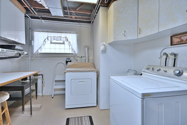 8532 N Olcott Ave, Niles, IL 60714 - washroom featuring cabinet space and washer and dryer