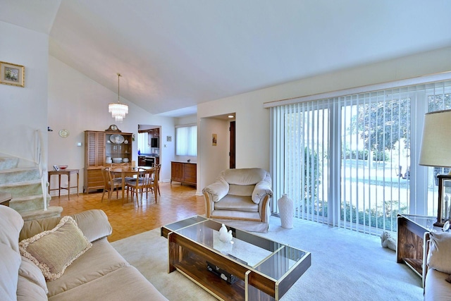 8532 N Olcott Ave, Niles, IL 60714 - living area with high vaulted ceiling and a chandelier