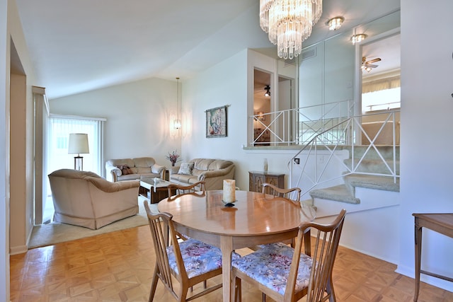 8532 N Olcott Ave, Niles, IL 60714 - dining room with a chandelier, vaulted ceiling, and ceiling fan