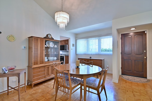 8532 N Olcott Ave, Niles, IL 60714 - dining space featuring a chandelier and a high ceiling