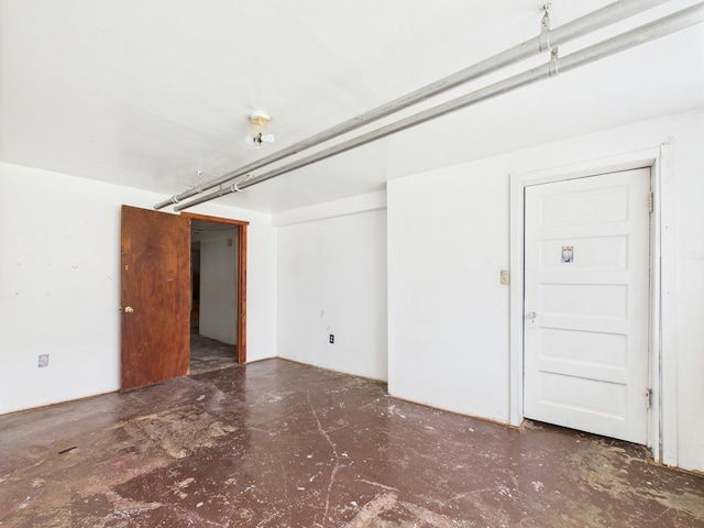 3109 W 53rd Pl, Chicago, IL 60632 - empty room with concrete flooring