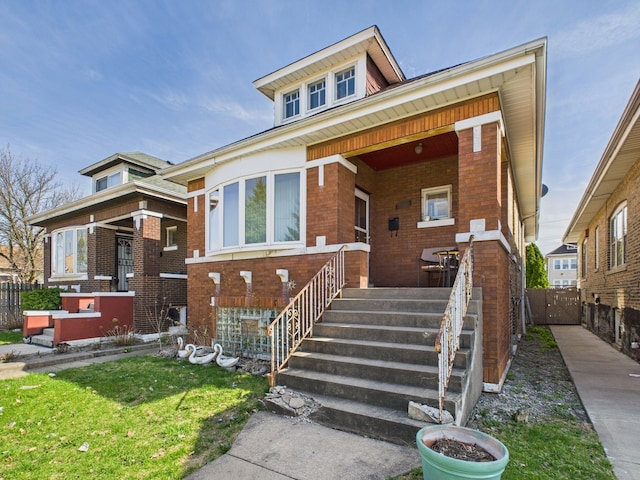 3109 W 53rd Pl, Chicago, IL 60632 - view of front facade featuring a porch and brick siding