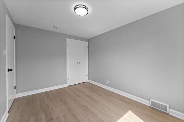 4025 Williams St, Downers Grove, IL 60515 - unfurnished bedroom featuring light wood-type flooring and baseboards