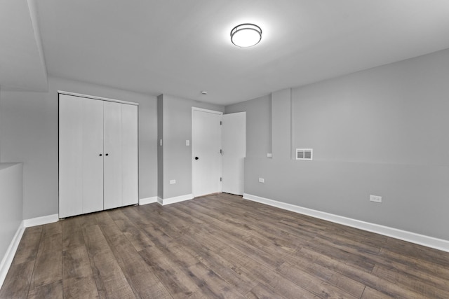 4025 Williams St, Downers Grove, IL 60515 - unfurnished bedroom featuring dark wood-style flooring and a closet