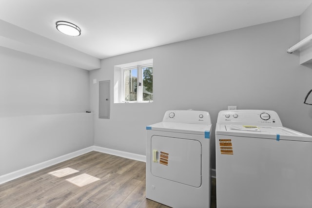 4025 Williams St, Downers Grove, IL 60515 - laundry room featuring washer and dryer, electric panel, and wood finished floors