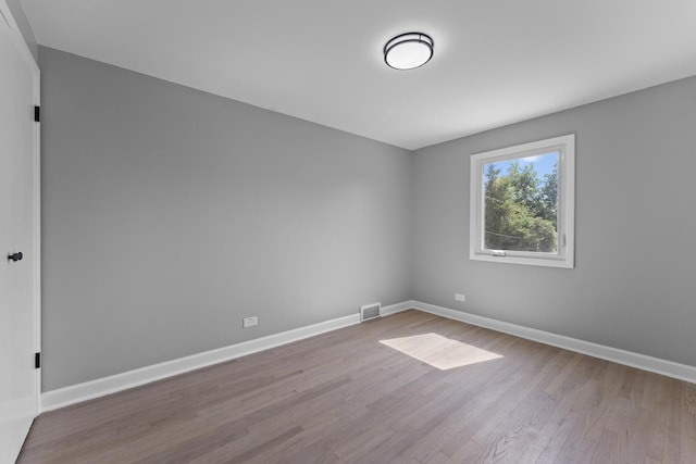 4025 Williams St, Downers Grove, IL 60515 - empty room featuring wood finished floors and baseboards