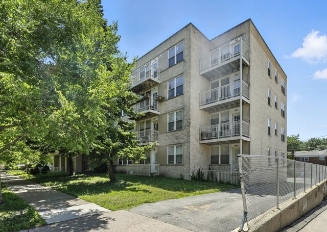 2501 W Touhy Ave Unit 105, Chicago, IL 60645 - view of apartment building / complex