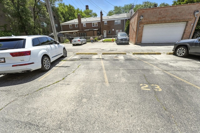 2501 W Touhy Ave Unit 105, Chicago, IL 60645 - view of uncovered parking lot