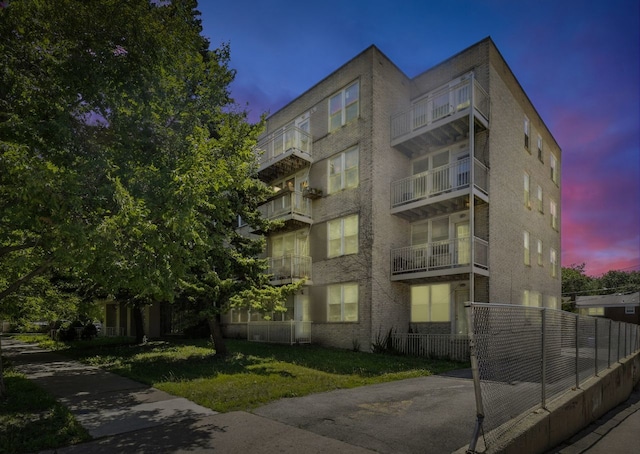 2501 W Touhy Ave Unit 105, Chicago, IL 60645 - view of property at dusk