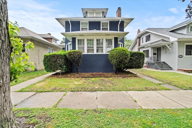 6510 Sinclair Ave, Berwyn, IL 60402 - american foursquare style home with a chimney and a front yard