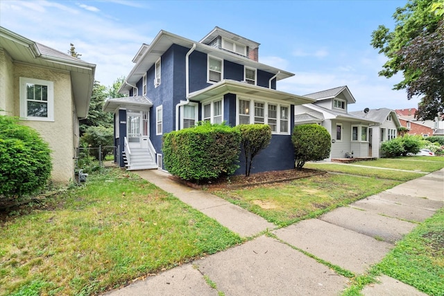 6510 Sinclair Ave, Berwyn, IL 60402 - traditional style home featuring a front yard and stucco siding