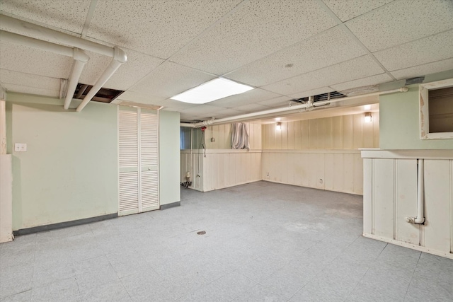 6510 Sinclair Ave, Berwyn, IL 60402 - finished below grade area with tile patterned floors and a drop ceiling