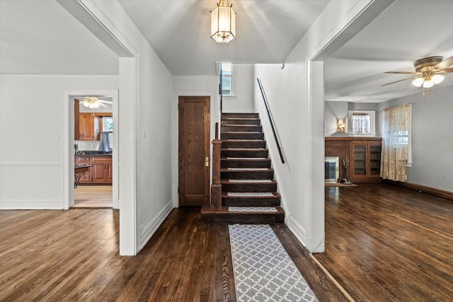 6510 Sinclair Ave, Berwyn, IL 60402 - stairs with a brick fireplace, ceiling fan, wood-type flooring, and healthy amount of natural light