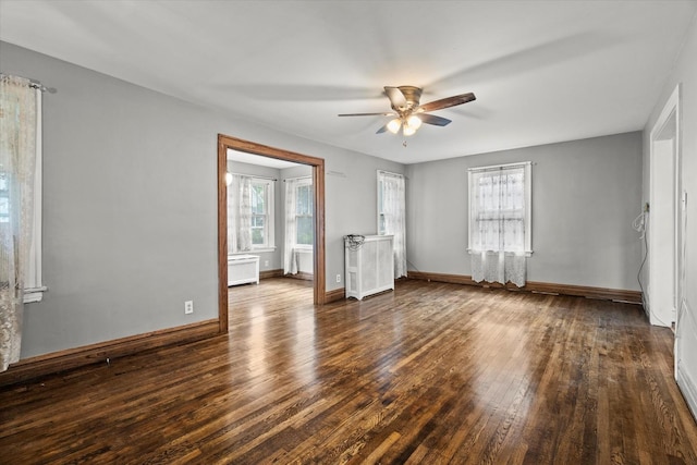6510 Sinclair Ave, Berwyn, IL 60402 - empty room with a ceiling fan and wood-type flooring
