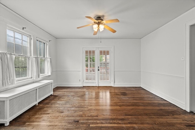 6510 Sinclair Ave, Berwyn, IL 60402 - spare room featuring radiator heating unit, ceiling fan, wood finished floors, and french doors