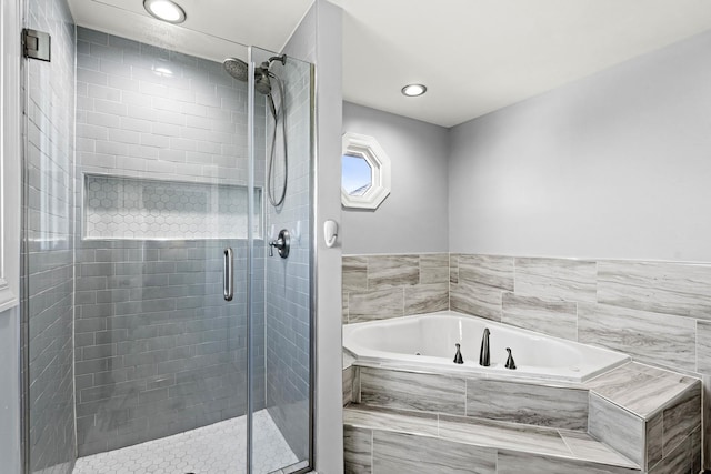 18140 Crystal Ln, Lansing, IL 60438 - bathroom featuring a garden tub, a shower stall, and recessed lighting