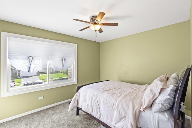18140 Crystal Ln, Lansing, IL 60438 - carpeted bedroom with baseboards and a ceiling fan