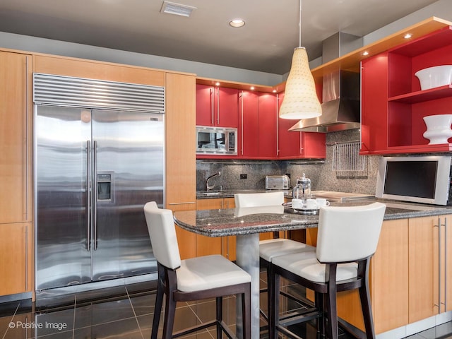 333 W Hubbard St Unit 1006, Chicago, IL 60654 - kitchen featuring built in appliances, wall chimney exhaust hood, decorative backsplash, open shelves, and recessed lighting