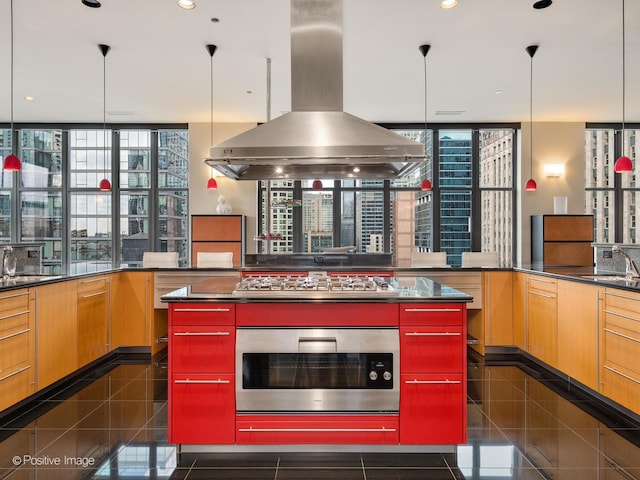 333 W Hubbard St Unit 1006, Chicago, IL 60654 - kitchen featuring island range hood, stainless steel gas cooktop, wall oven, dark countertops, and granite floors