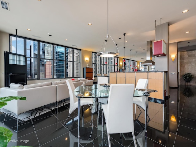 333 W Hubbard St Unit 1006, Chicago, IL 60654 - dining area featuring granite tiled floors and recessed lighting