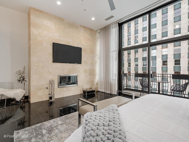 333 W Hubbard St Unit 1006, Chicago, IL 60654 - bedroom with access to outside, granite tiled floors, recessed lighting, and floor to ceiling windows