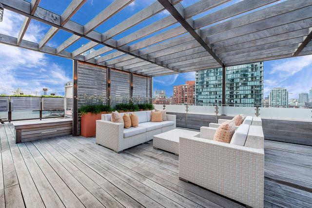 333 W Hubbard St Unit 1006, Chicago, IL 60654 - wooden deck with an outdoor living space, a view of city, and a pergola