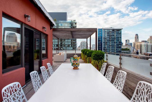 333 W Hubbard St Unit 1006, Chicago, IL 60654 - patio / terrace featuring a city view, outdoor dining space, and a pergola
