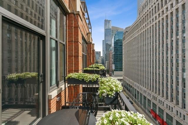333 W Hubbard St Unit 1006, Chicago, IL 60654 - balcony featuring a skyline view