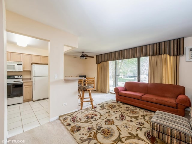249 W Court Of Shorewood Unit 1B, Vernon Hills, IL 60061 - living area featuring light colored carpet, a ceiling fan, and light tile patterned floors