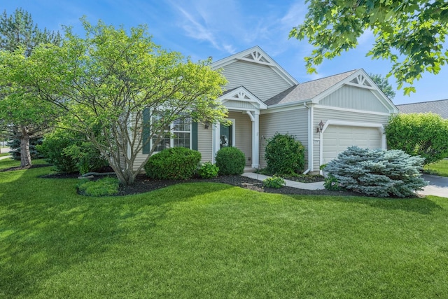 11397 Stonewater Xing, Huntley, IL 60142 - view of front of home with an attached garage, a front yard, and a shingled roof