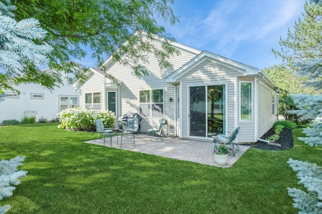 11397 Stonewater Xing, Huntley, IL 60142 - back of property featuring a yard and a patio area