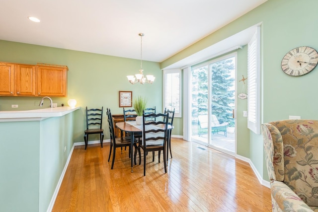 11397 Stonewater Xing, Huntley, IL 60142 - dining room with a chandelier, plenty of natural light, light wood-type flooring, and recessed lighting