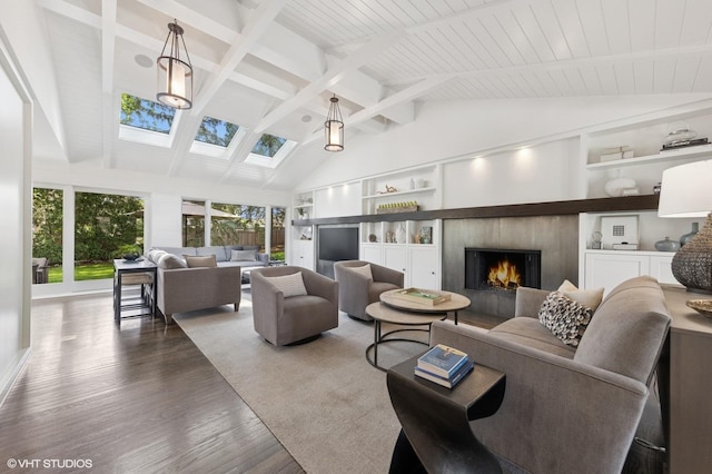 19 N Stough St, Hinsdale, IL 60521 - living room with a skylight, wood finished floors, a warm lit fireplace, and built in features
