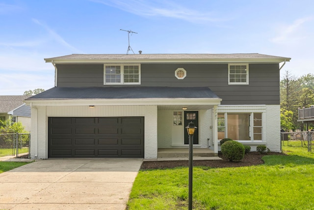 1707 N Park Dr, Mount Prospect, IL 60056 - view of front of house with driveway, a porch, brick siding, and an attached garage