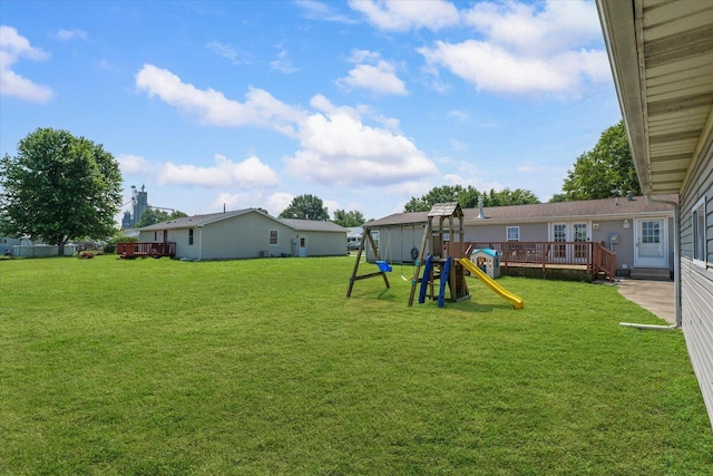510 W Rhodes St, Thomasboro, IL 61878 - view of green lawn with a playground