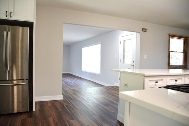 2811 Limerick Dr, Cary, IL 60013 - kitchen featuring freestanding refrigerator, healthy amount of natural light, white cabinetry, and light countertops