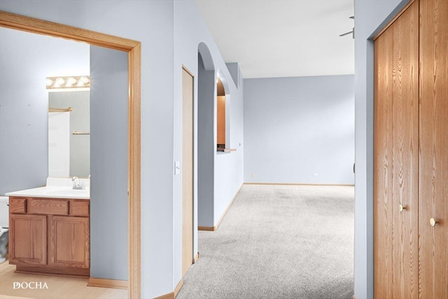 1422 Citadel Dr Unit 0, Joliet, IL 60435 - hallway featuring arched walkways and light carpet