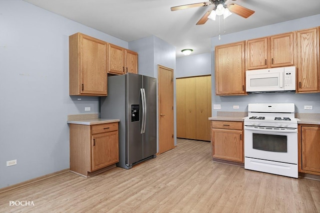 1422 Citadel Dr Unit 0, Joliet, IL 60435 - kitchen with white appliances, light countertops, and light wood-style floors