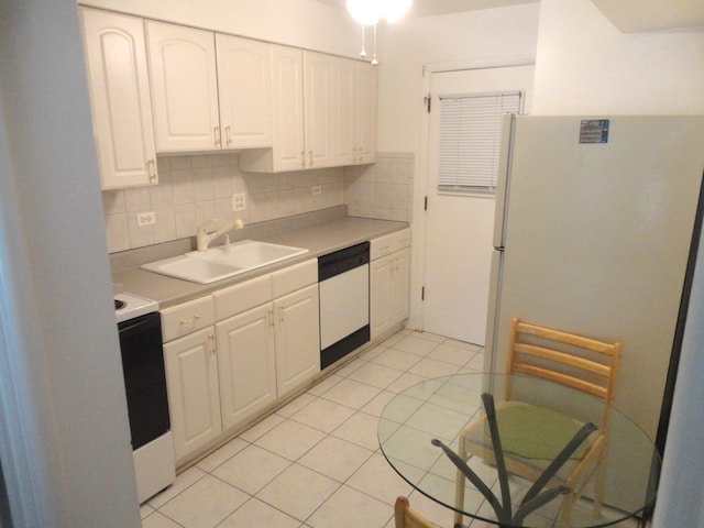9703 Bianco Ter Unit B, Des Plaines, IL 60016 - kitchen with white appliances, white cabinets, decorative backsplash, light countertops, and light tile patterned floors