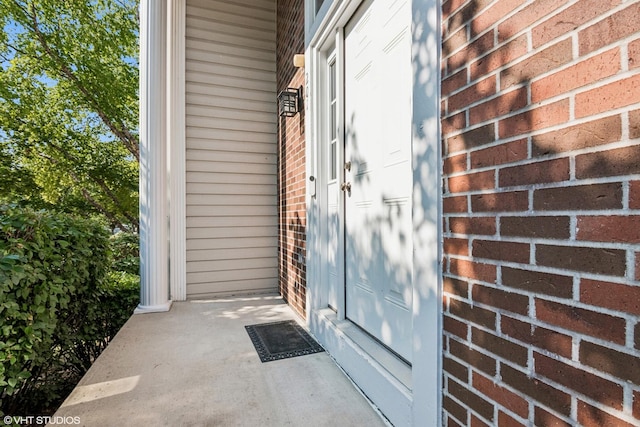 201 Hidden Creek Ln Unit 201, North Aurora, IL 60542 - property entrance featuring brick siding