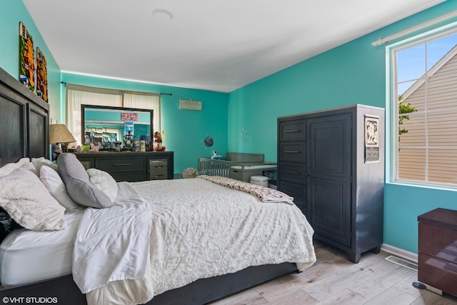 201 Hidden Creek Ln Unit 201, North Aurora, IL 60542 - bedroom with wood finished floors and baseboards