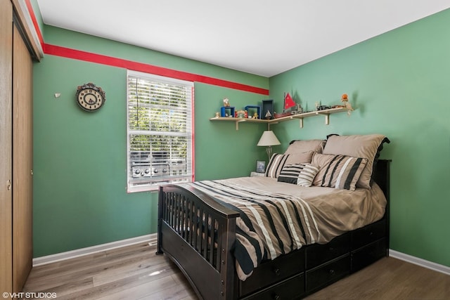 201 Hidden Creek Ln Unit 201, North Aurora, IL 60542 - bedroom with wood finished floors