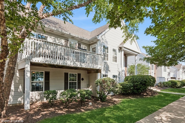 201 Hidden Creek Ln Unit 201, North Aurora, IL 60542 - view of property exterior featuring a yard