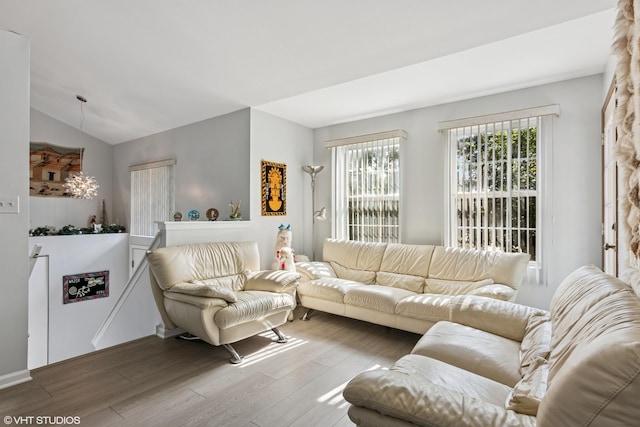 201 Hidden Creek Ln Unit 201, North Aurora, IL 60542 - living room with wood finished floors and vaulted ceiling