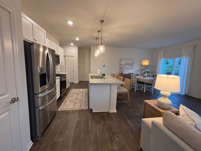 1135 Williamsburg St, Pingree Grove, IL 60140 - kitchen featuring stainless steel refrigerator with ice dispenser, range with gas cooktop, dark wood-style floors, white cabinets, and recessed lighting