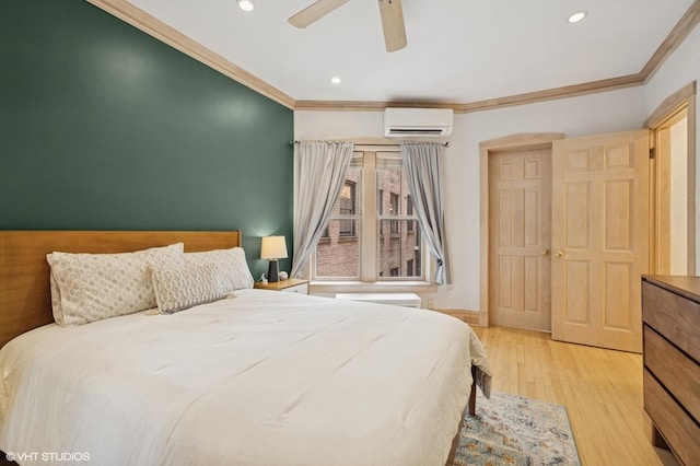 622 W Waveland Ave Unit 2W, Chicago, IL 60613 - bedroom with a wall mounted AC, crown molding, wood finished floors, recessed lighting, and a ceiling fan